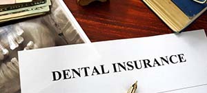 Dental insurance form resting on a table