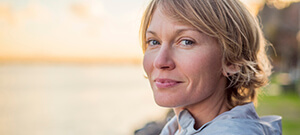 Woman smiling after restorative dentistry